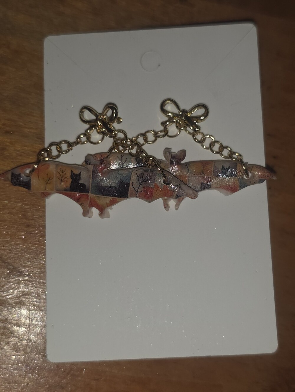 Wide Polymer Clay Bat Wing Earrings Hanging From Short Chains W Bow Stud Posts